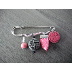 Broche rose noir faïence et ruban sur acier inoxydable anallergique