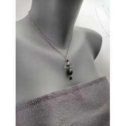 Ceramic turquoise black necklace on stainless steel chain.