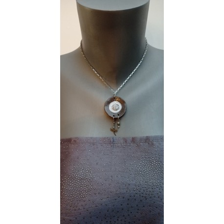 White enamelled black earth pendant