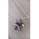 Collier céramique puzzle rose turquoise blanc et noir