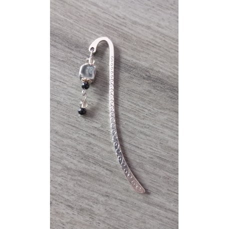 Grey, black ceramic and silver metal page mark