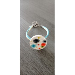 Colorful homemade earthenware bracelet on blue leather and stainless steel made in france vendée
