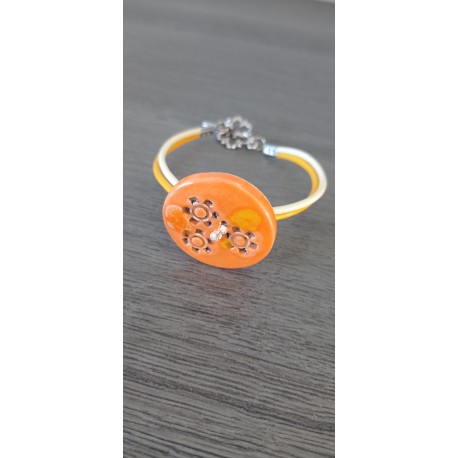 Colorful homemade earthenware bracelet on blue leather and stainless steel made in france vendée